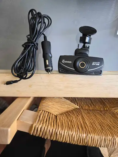 Capture every moment on the road with this DOD LS470W dashcam, known for its reliable performance an...