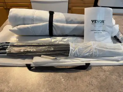 Brand new, still in original packaging, Vevor spray paint tent with built in floor and mesh screen....