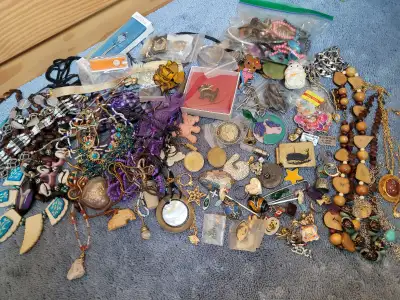 Large pile of costumenecklaves, earrings, rings and more. As is. $20 for everything.