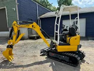 2 Ton excavator with Kubota engine. Comes with coupler, thumb and digging bucket. Retractable under...