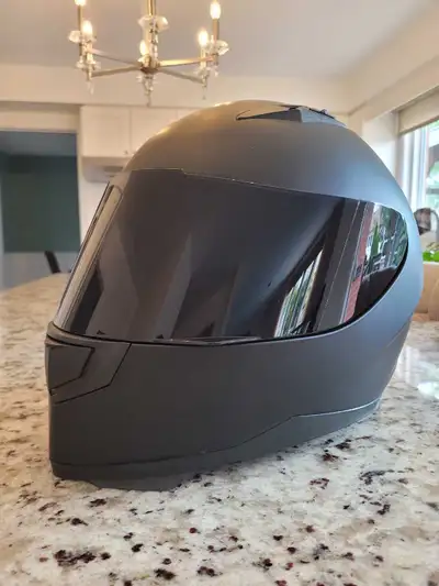 Brand new basically. Comes in box with addition of clear visor, carrying case/bag and detachable nec...