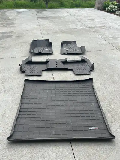 2021 GMC Yukon Denali brown floor mats and cargo liner. May fit other years as well. Approx $600 new...
