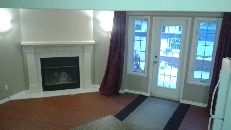 Spacious Split Level 1 Bedroom Basement with Storage & Fireplace 2