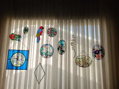 Various "stained glass" suncatchers., View more