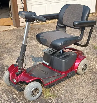 QQ ----- PRICE REDUCTION; PRIDE REVO 2.0 4 wheel scooter, 400 lbs., cap., 2 12 volt 35 amp batteries...