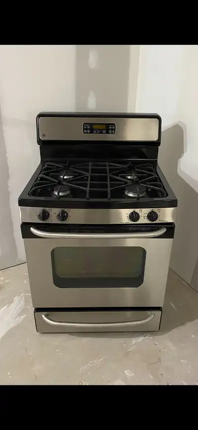 - GE brand - 4 burner gas stove - 30” wide, 26” deep, 47.5” total height - very clean, everything in...