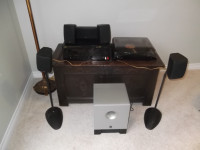 Polk Surround Sound Home Theater speaker system.