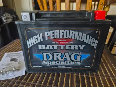 Drag Specialties 12 volt motorcycle battery. Purchased less than a week ago. 1 year warranty. $55 le...