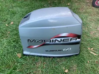 Have a few parts from a 96 mariner 40 magnum Message me what ypu may need. Cowling in pic is availab...