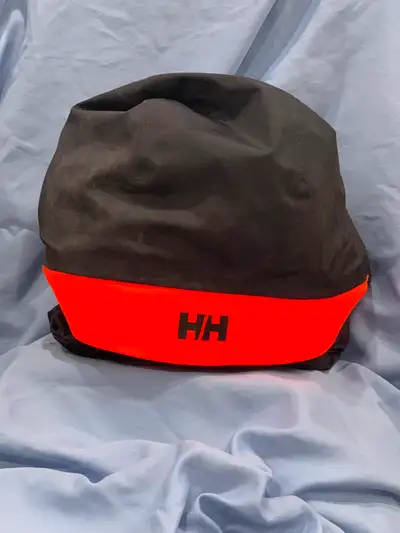 Helly Hanson waterproof 1-piece rain suit. Rolled up it's the size of a football for easy portabilit...