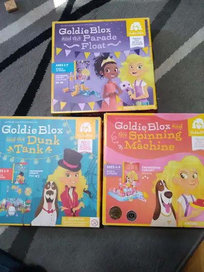 Goldie Blox and the Parade Float; and the Dunk Tank; and the Spinning Machine. No missing pieces. Gr...