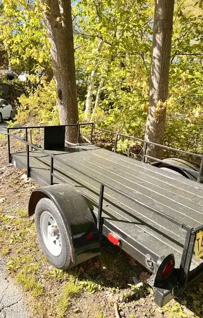 Black Utility Trailer 8 ft by 4.5 ft New tires and rims Safety Inspection until 2028 If you have any...