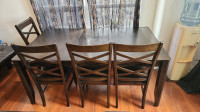 Solid wood kitchen table and 4 solid chairs. Moving sale!!