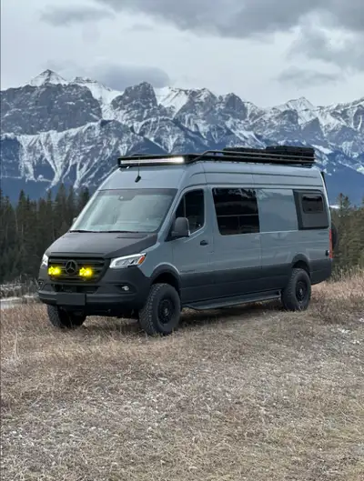 This all-season 4x4 camper van is built for off-grid adventure, offering seating and sleeping for fo...