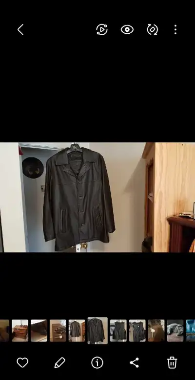 Men's size medium brown leather car coat. , View more