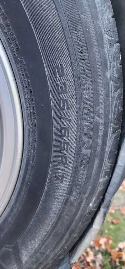 Set of four Hyundai rims with tires, sized at 235/65R17. 1 of 4 tires has bad wear and all are being...