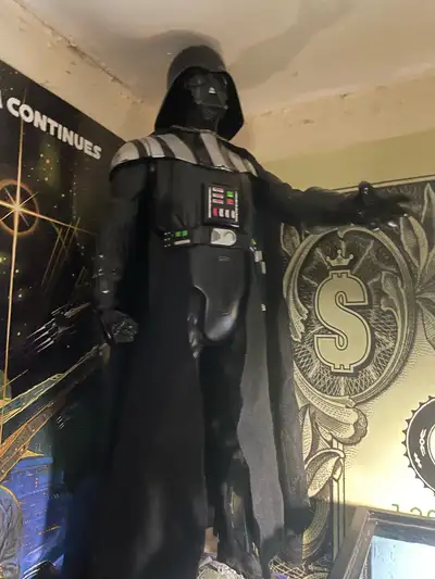 Darth Vader 2Ft good for Halloween or man cave small hole in back can’t see behind cape