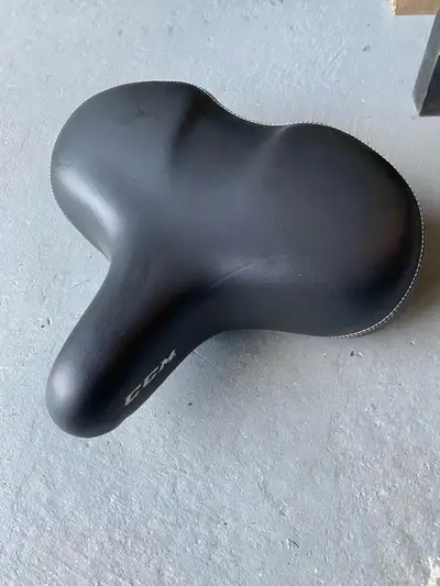 Brand new wide bike saddle for comfort ride.