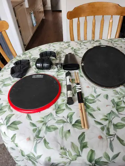 Assorted drum items., View more