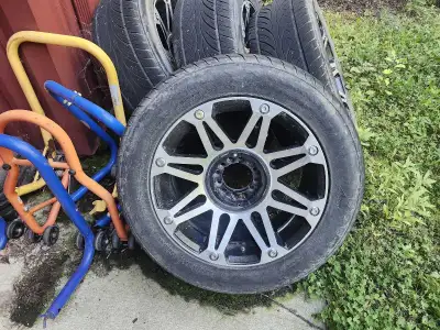 20 inch Mayhem rims, dual bolt pattern. Were off an f150 Wrapped in 275-55/20s Skins are good till t...