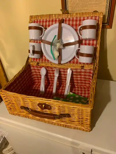 Price drop.. Beautiful picnic basket for sale with plates, cups, knives, forks and spoons. Just what...