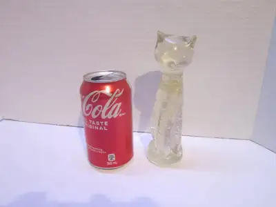 This cat is in good used condition with no damage. It measures 7 inches tall, 1&3/4 inches long and...