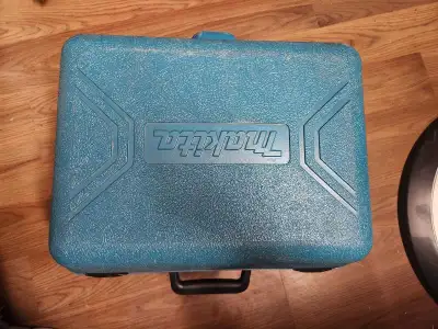 This durable Makita hard plastic tool case, providing a secure and organized storage solution for yo...