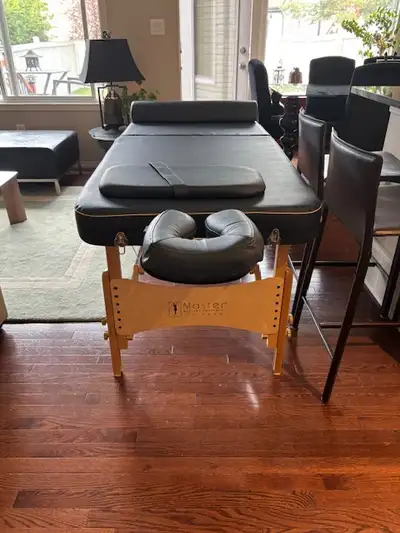 29" Portable Massage Table. Master Brand. In very good condition complete with Face Cradle, Padded A...