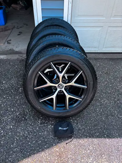 Michelin Defender LTX M/S 235/55R18. Rims are premiere Toyota brand rims, tires have a couple more y...