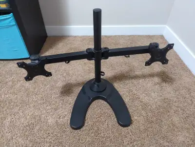 This sturdy monitor stand is highly adjustable to mount two monitors. Compatible with vesa 75 or 100...
