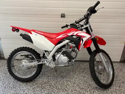 2021 Honda CRF125 big wheel, like new, electric start, fuel injected, has less than 15 hours on it,...