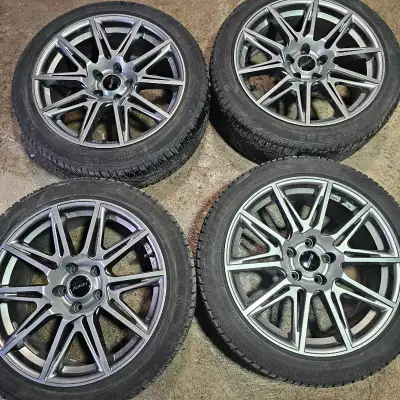 selling four 18 inch Fast alloy rims with Continental winter tires and TPMS sensors for $1350. 90% o...