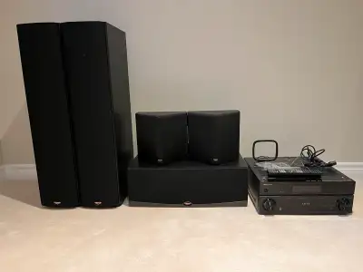 In excellent condition. This home theatre system includes 5 high quality speakers and one receiver (...