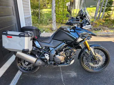Like new only 3700kms, 3.5 years of warranty left. Over 5000 in extras, exhaust, heated grips, crash...