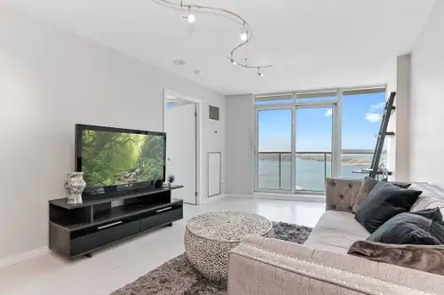 Starting August 1 - Unbeatable and totally unobstructed lake view with a wrap around balcony accessi...