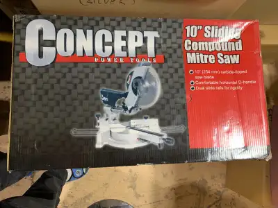 CONCERT 10 in. Sliding Compound Mitre Saw. 10 in. carbide-tipped saw blade. Dual slide rails for rig...