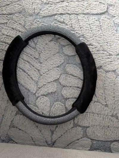Fuzzy and gem covered steering wheel cover brand new $20 obo Pick up, meet , delivery Pick up near w...