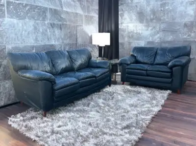 Black leather couch set in fair condition, couch a few scratches. Comes from a smoke home, $400 obo...
