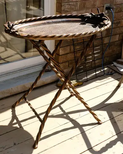 A sturdy ornate all metal side table or food/ drink serving tray with decorative bird figurines and...