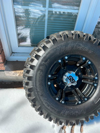 4 wheeler aluminum rims and tires barely used