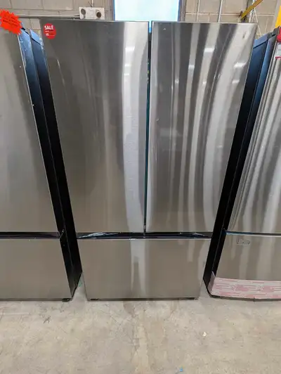 This is a Samsung stainless steel french door refrigerator. It is in nearly new condition and is gen...