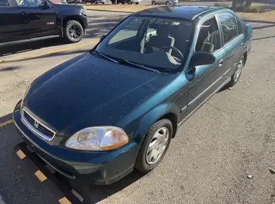 240,000km Runs excellent, no mechanical problem at all. Has only minor rust at both side rear fender...