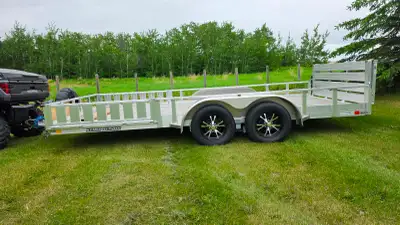 18' Stronghaul tandem axle aluminum trailer. Has LED lights, side ramp and matching spare. Will fit...