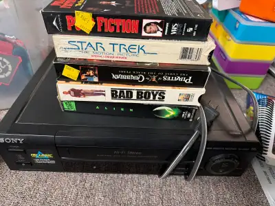 Sony VHS player and 5 movies , View more
