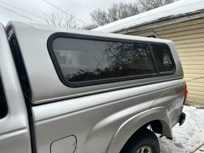Nice silver canopy for a ford ranger or a b4000 or any other truck with the same size box 6 foot or...