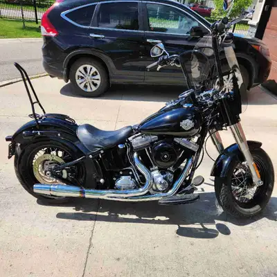 Selling my 2015 Softail Slim. 103 ci engine, 6 speed trans, memphis shades slim windshield, 14" bars...