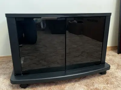 TV Stand with glass doors/ wheels and under storage, View more
