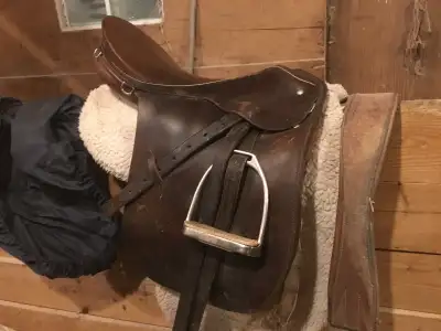 Older Passier English saddle in good condition, sold with cinch, stirrups and saddle pad. Asking $49...