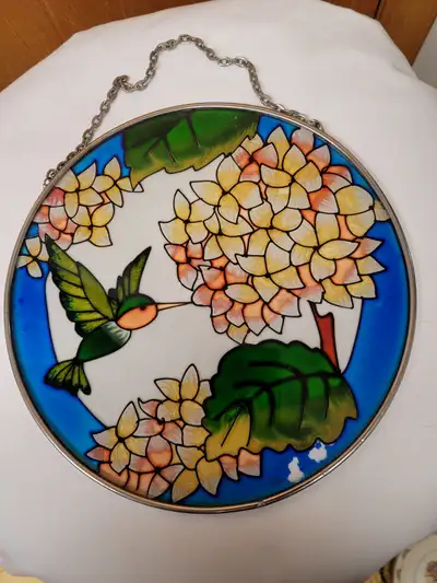 Round Humming Bird Sun Catcher Hand-painted on glass Features a green humming bird and cluster of fl...