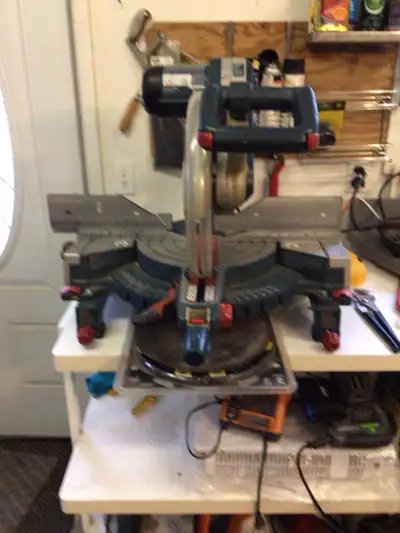  PROFESSIONAL BOSCH 12” SLIDING MITRE SAW  WITH STAND & 3 New Bl, View more